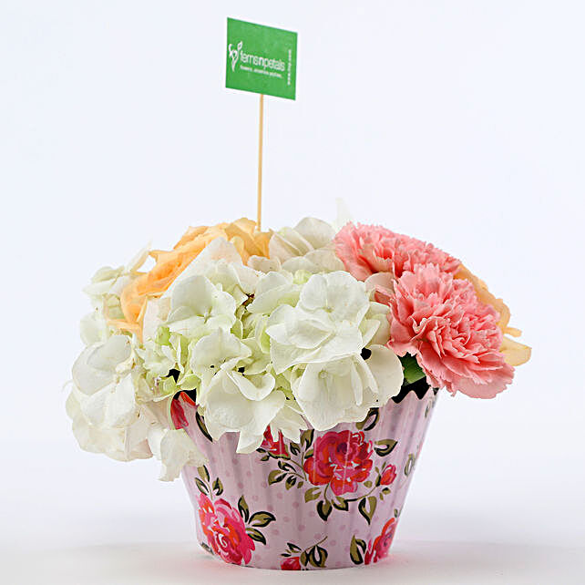 carnations and roses in cupcake arrangement