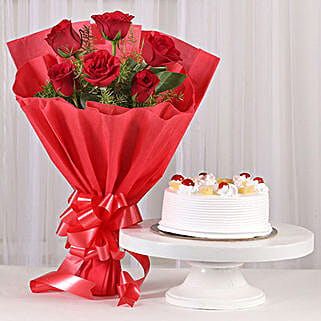 Delightful Divine - Bunch of 6 Red Roses with Pineapple Cake 500gms.