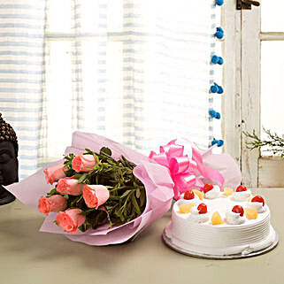 Elegant Wishes - Bunch of 6 Pink Roses with 500gm Pineapple Cake.