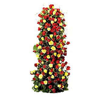 Endless Love - 3-4 ft high arrangement of 100 red and yellow roses.