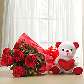 Flowerly and Fluffily Yours - Gift hamper of 6 Red Roses along with 1 small teddy bear.
