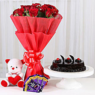 Sweet Combo For Sweetheart - Bunch of 15 Red Roses in paper packing With 6inch Soft toy, 500gm Truffle Cake & 5 cadbury chocolate (14gm each).